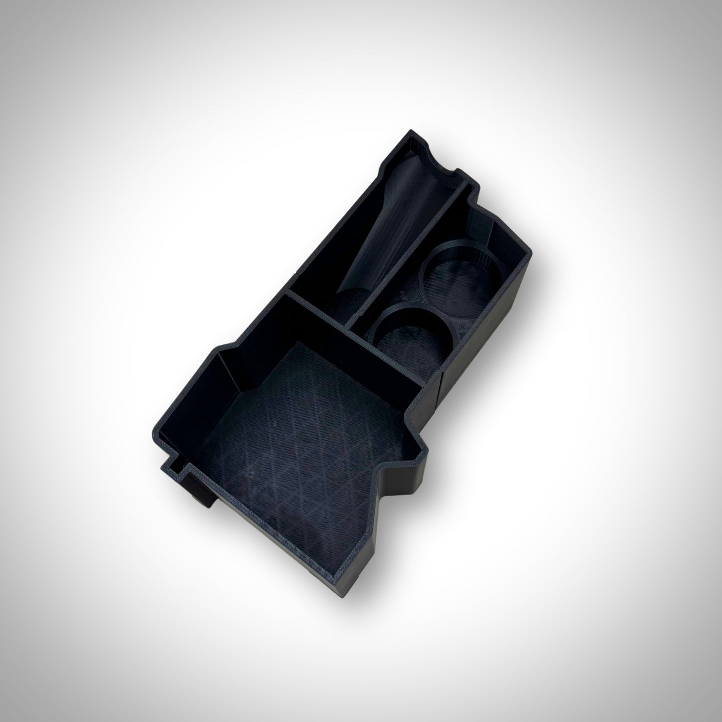 M12 Expansion Tool insert resting outside the PACKOUT™ Compact Organiser, showing structural detail and component slots.