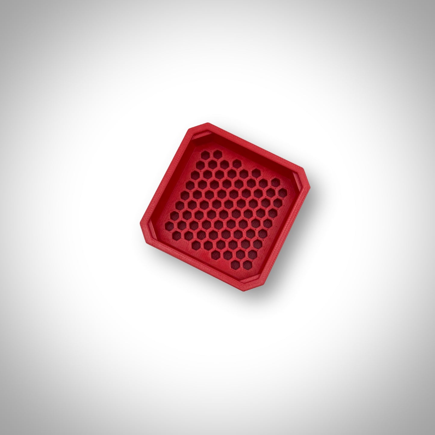 Red Hex Bit Holder insert displayed outside a Milwaukee PACKOUT™ bin, highlighting the layout for 76 bits.
