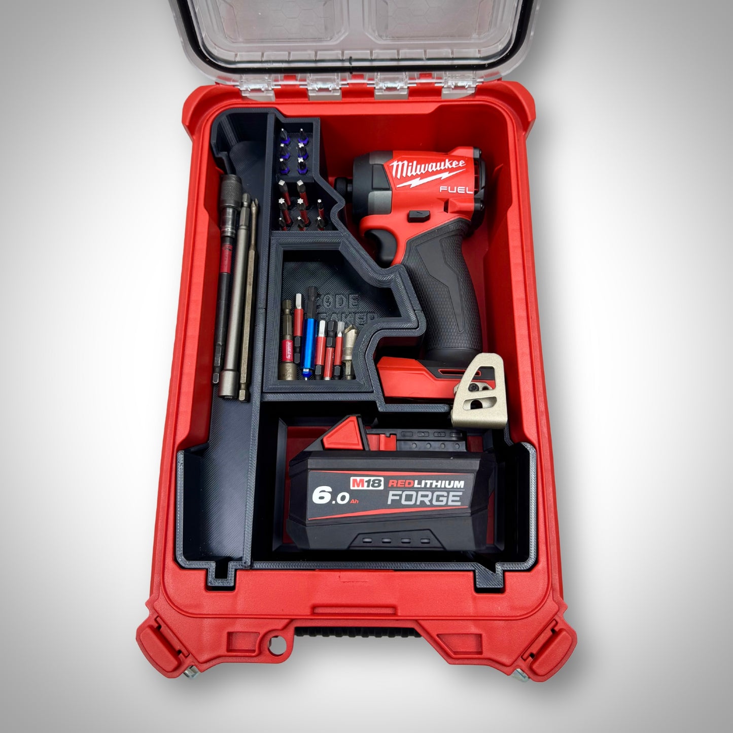 M18 Impact Driver Insert loaded with the driver, batteries, and bits, neatly stored inside the Milwaukee PACKOUT™ Compact Organiser.