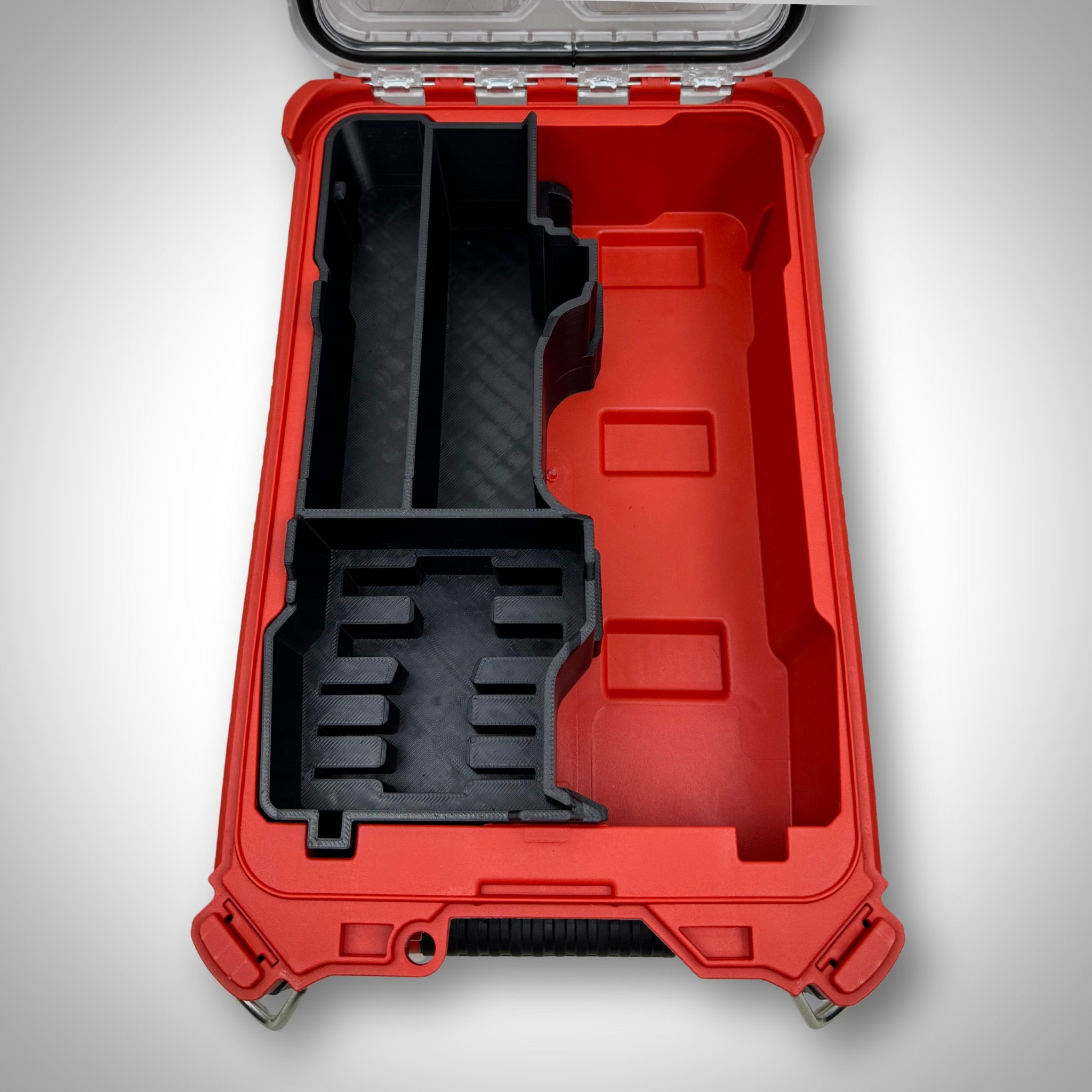 Empty insert placed in the Milwaukee PACKOUT™ Compact Organiser, showing all dedicated compartments for the M18 Multi Tool and its attachments.