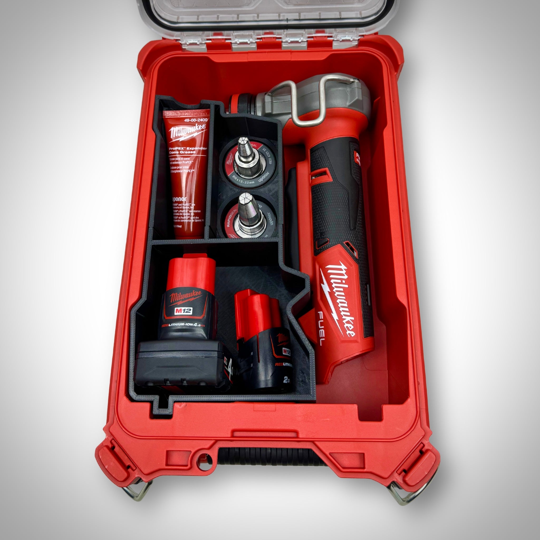 M12 Expansion Tool and all compatible heads and accessories securely stored in the insert inside the Milwaukee PACKOUT™ Compact Organiser.