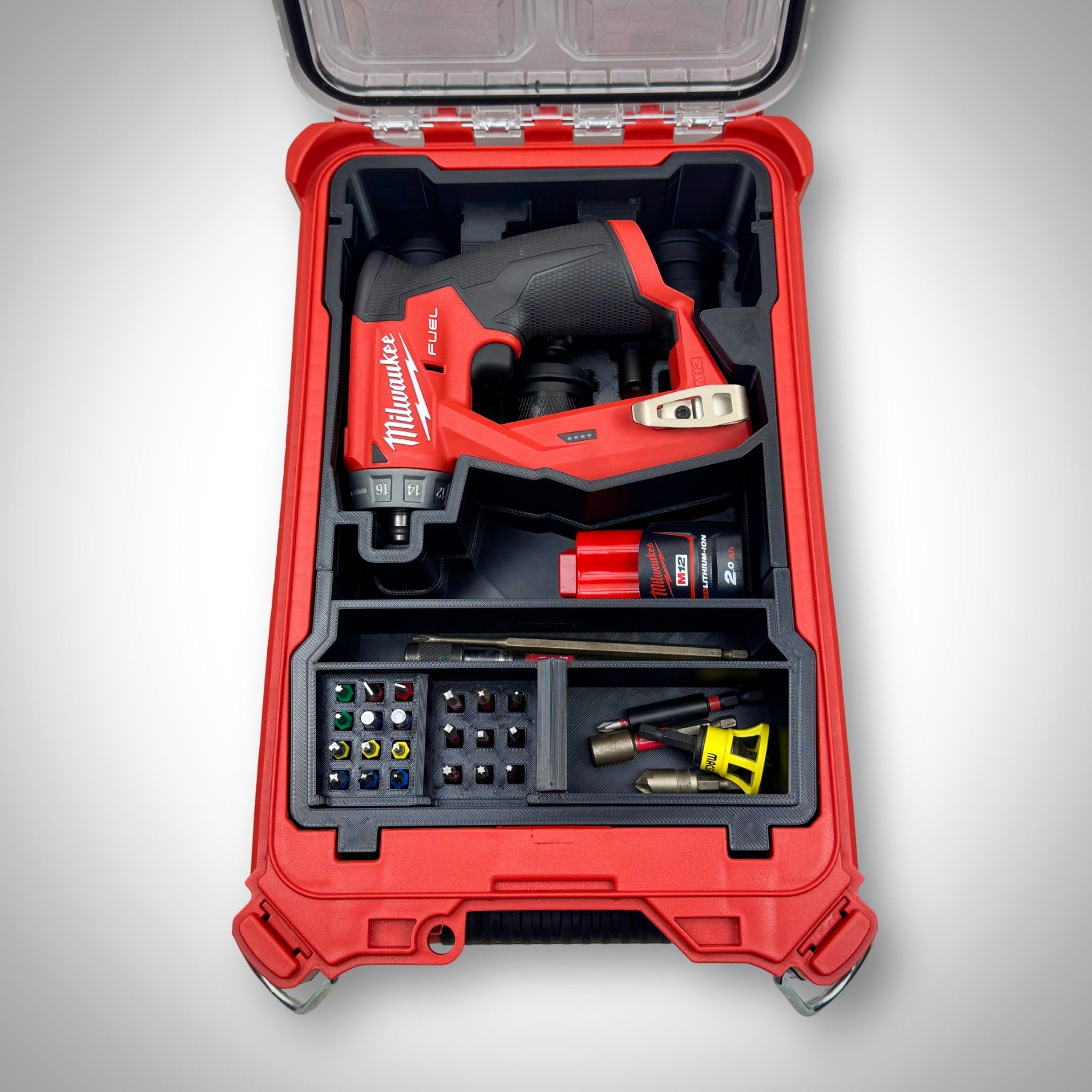 Milwaukee PACKOUT Compact Organiser with Installation Driver insert fully loaded with the driver, heads, and accessories, neatly organized inside the container.