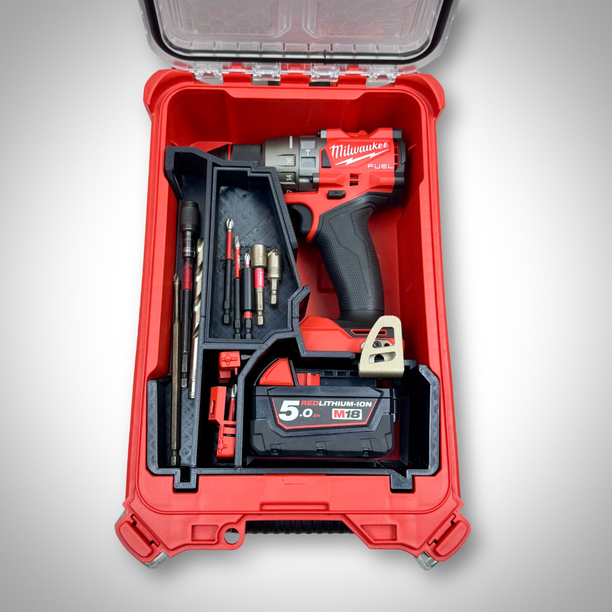 M18 Drill Insert fully loaded with M18 drill, batteries, and accessories, securely arranged inside the Milwaukee PACKOUT™ Compact Organiser.