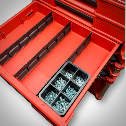 Milwaukee PACKOUT™ 6-Way Divider Bin fully loaded with screws, bits, and tiny gear, secured inside the 4-Drawer Toolbox.