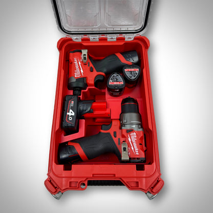 Red custom insert in PACKOUT™ Compact Organiser holding the M12 Hammer Drill, M12 Impact Driver, batteries, and bits neatly in place.