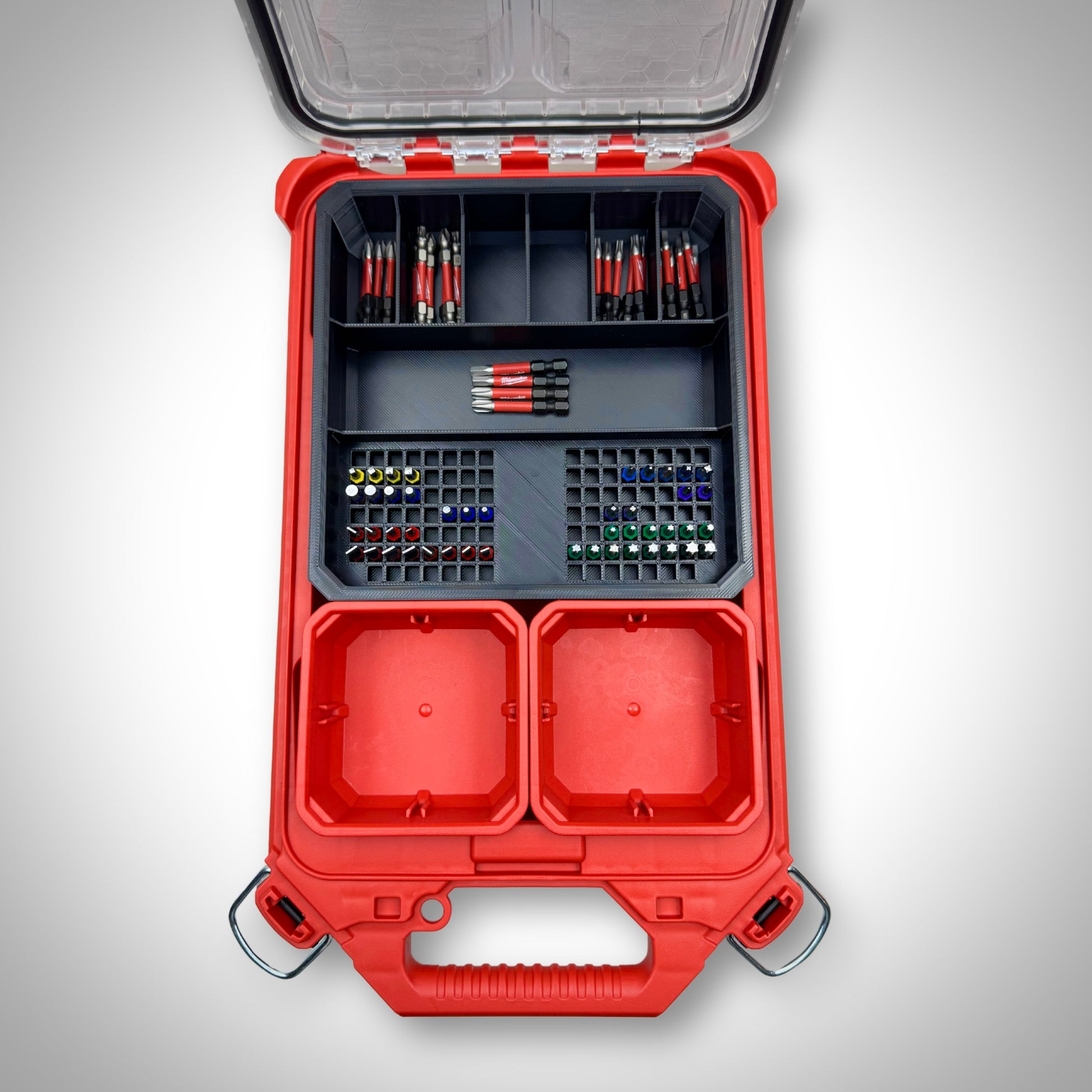 Milwaukee PACKOUT™ Low Profile Organiser featuring the Impact Bit Holder V2 fully loaded with 50mm bits and extension bits, neatly arranged inside the toolbox.