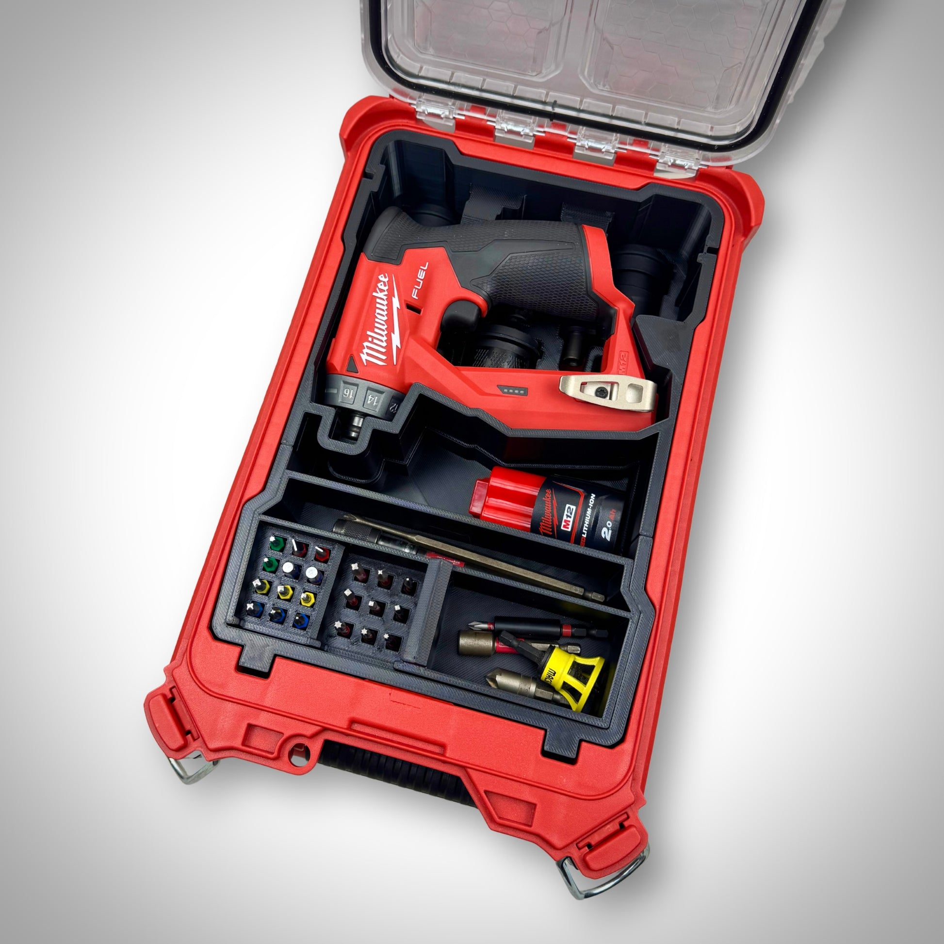 Milwaukee PACKOUT Compact Organiser with Installation Driver insert fully loaded with the driver, heads, and accessories, neatly organized inside the container.