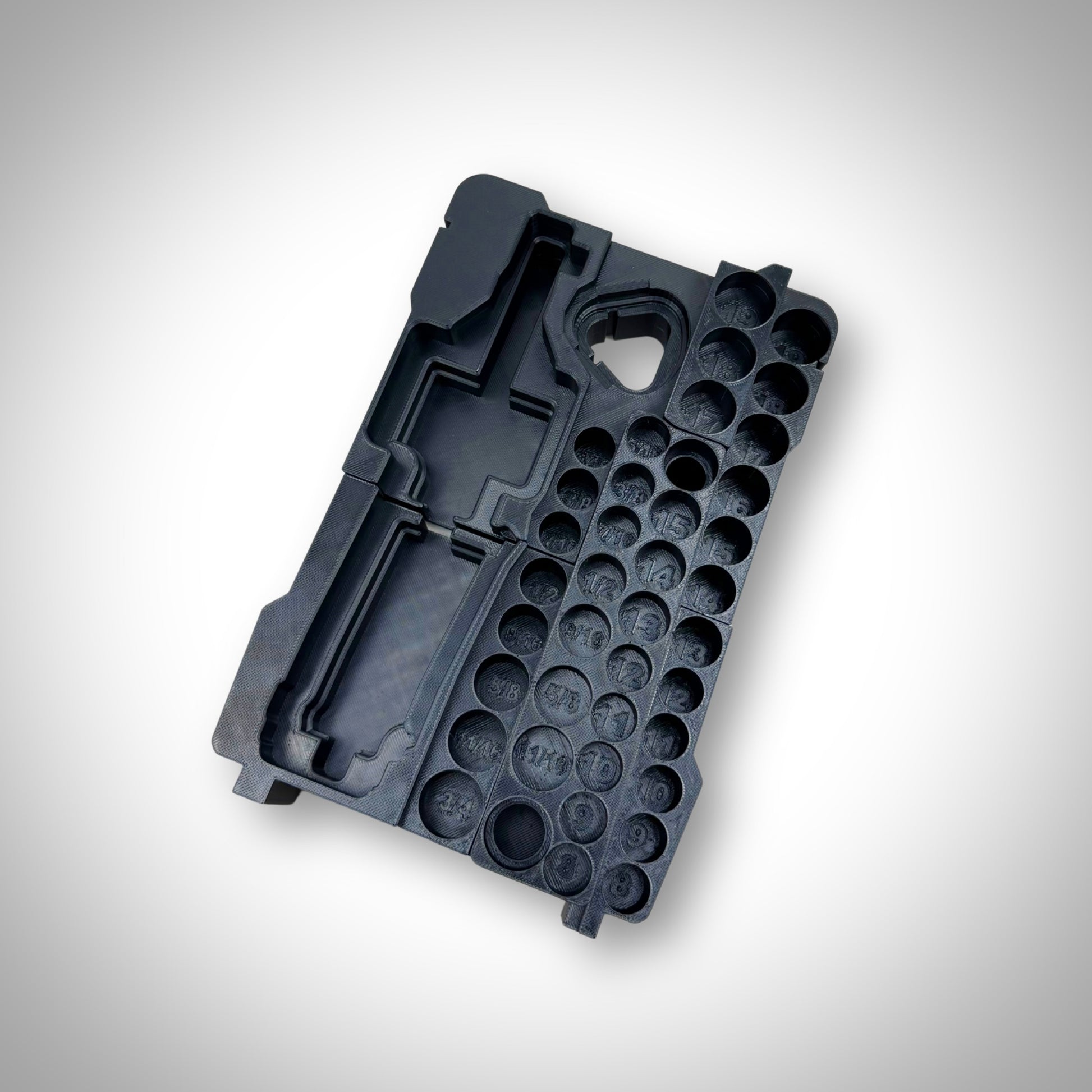 Empty M12 Ratchet & 3/8" Socket Set Insert displayed outside the Milwaukee PACKOUT™ Compact Organiser, highlighting its durable and custom-moulded compartments.