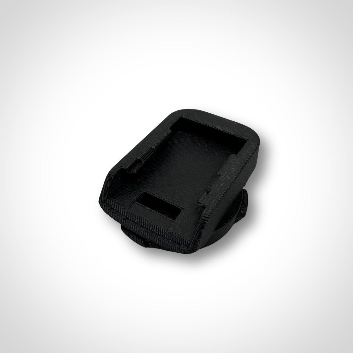 Adaptor insert displayed standalone outside the PACKOUT™, highlighting precision-fit slots for DeWalt batteries.