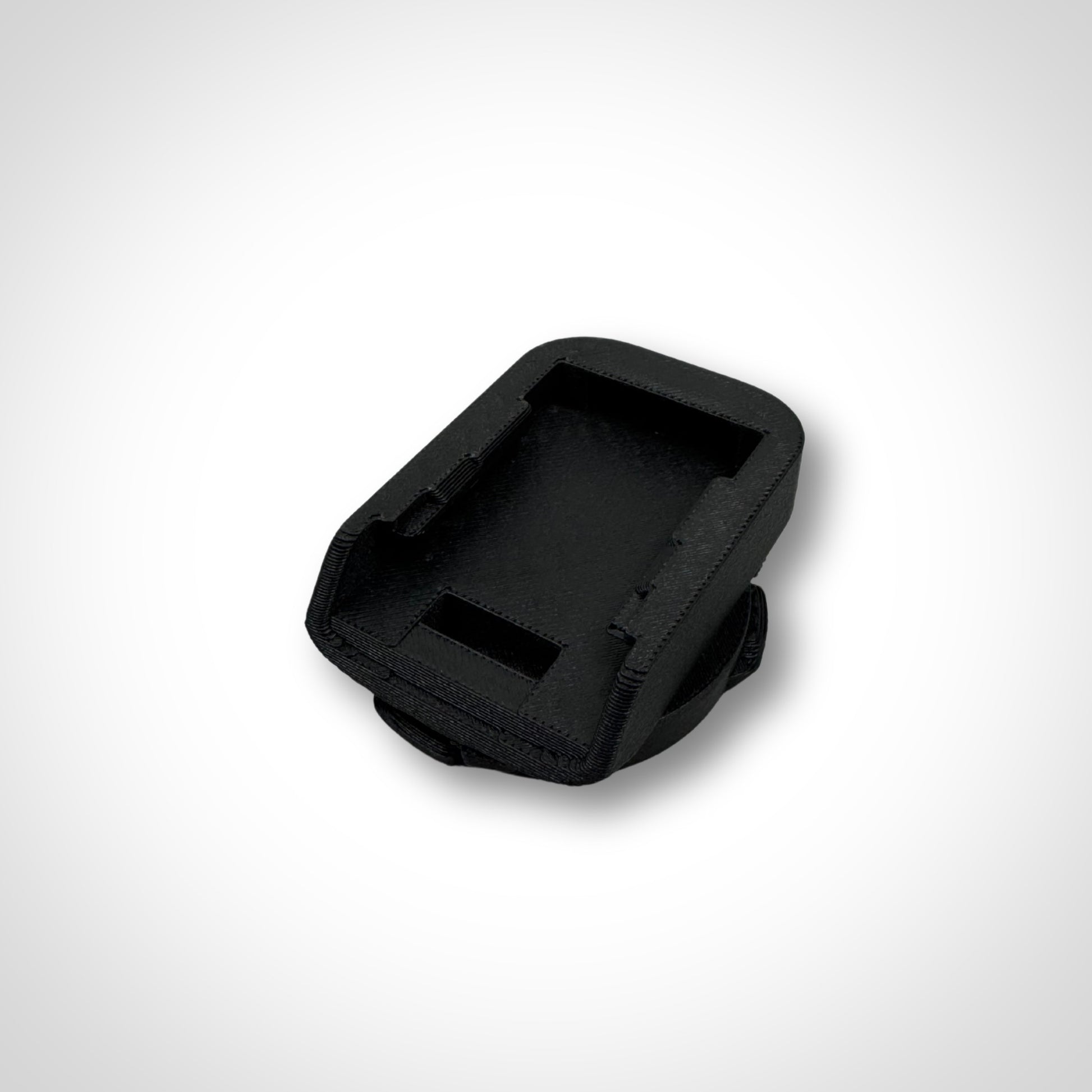 Adaptor insert displayed standalone outside the PACKOUT™, highlighting precision-fit slots for DeWalt batteries.