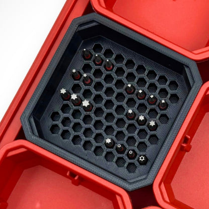 “Black Hex Bit Holder insert with a few 1-inch hex bits, organised neatly inside a Milwaukee PACKOUT™ bin.