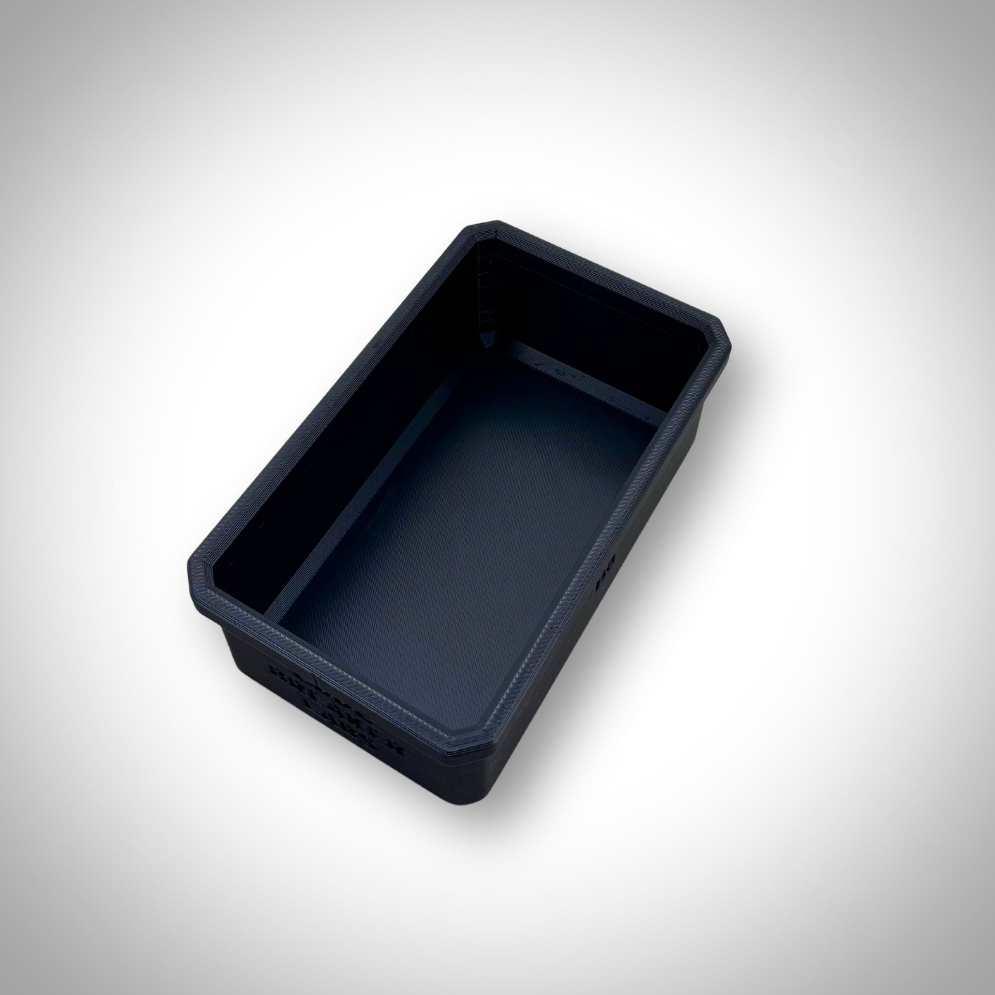 Empty Milwaukee PACKOUT™ Full Bin displayed outside the 4-Drawer Toolbox, showing its spacious single compartment.