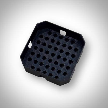 Black Milwaukee PACKOUT™ Low-Profile Bit Holder Insert displayed outside the PACKOUT™ bin, highlighting its durable construction and slim profile.