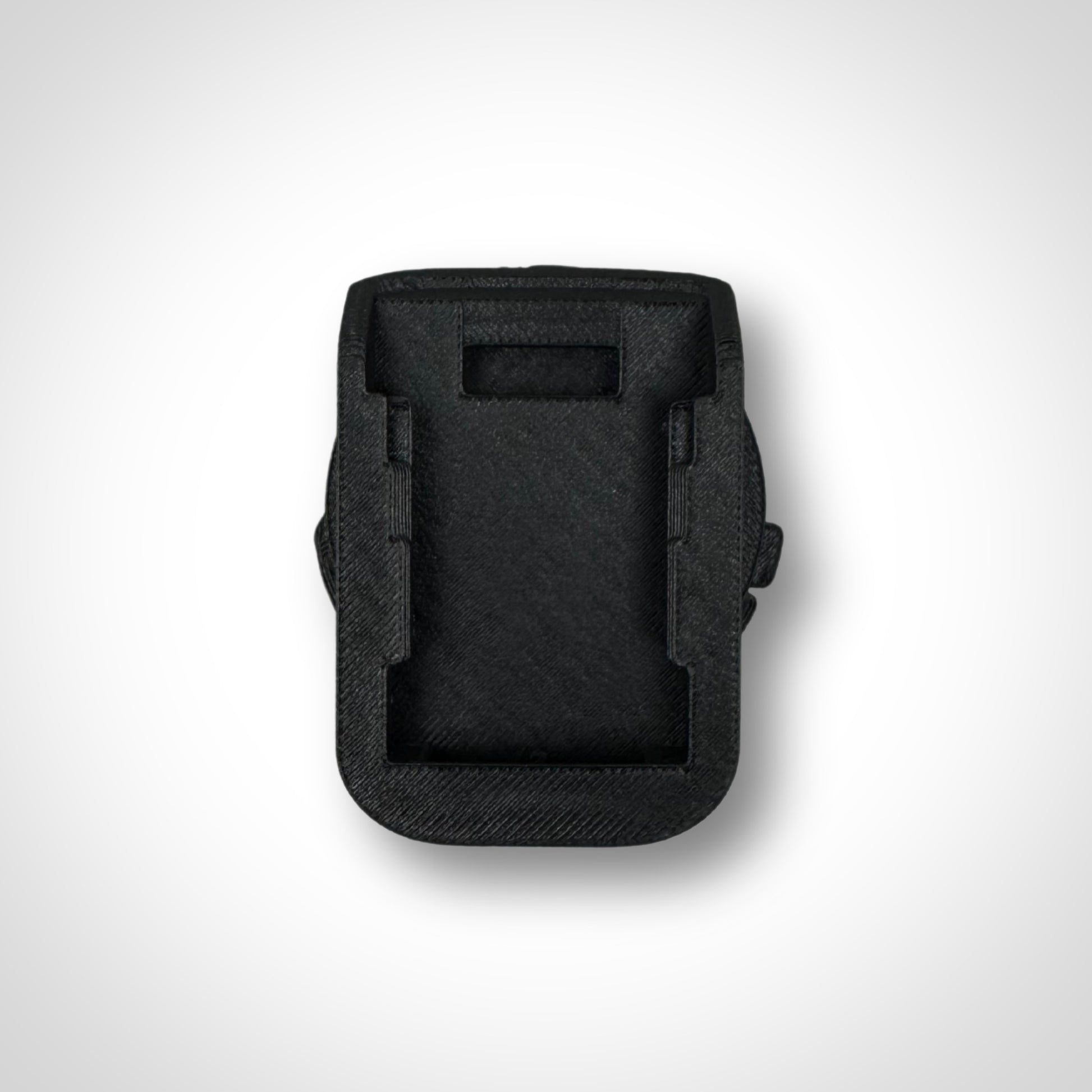 Adaptor insert displayed standalone outside the PACKOUT™, highlighting precision-fit slots for DeWalt batteries.