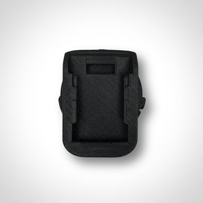 Adaptor insert displayed standalone outside the PACKOUT™, highlighting precision-fit slots for DeWalt batteries.