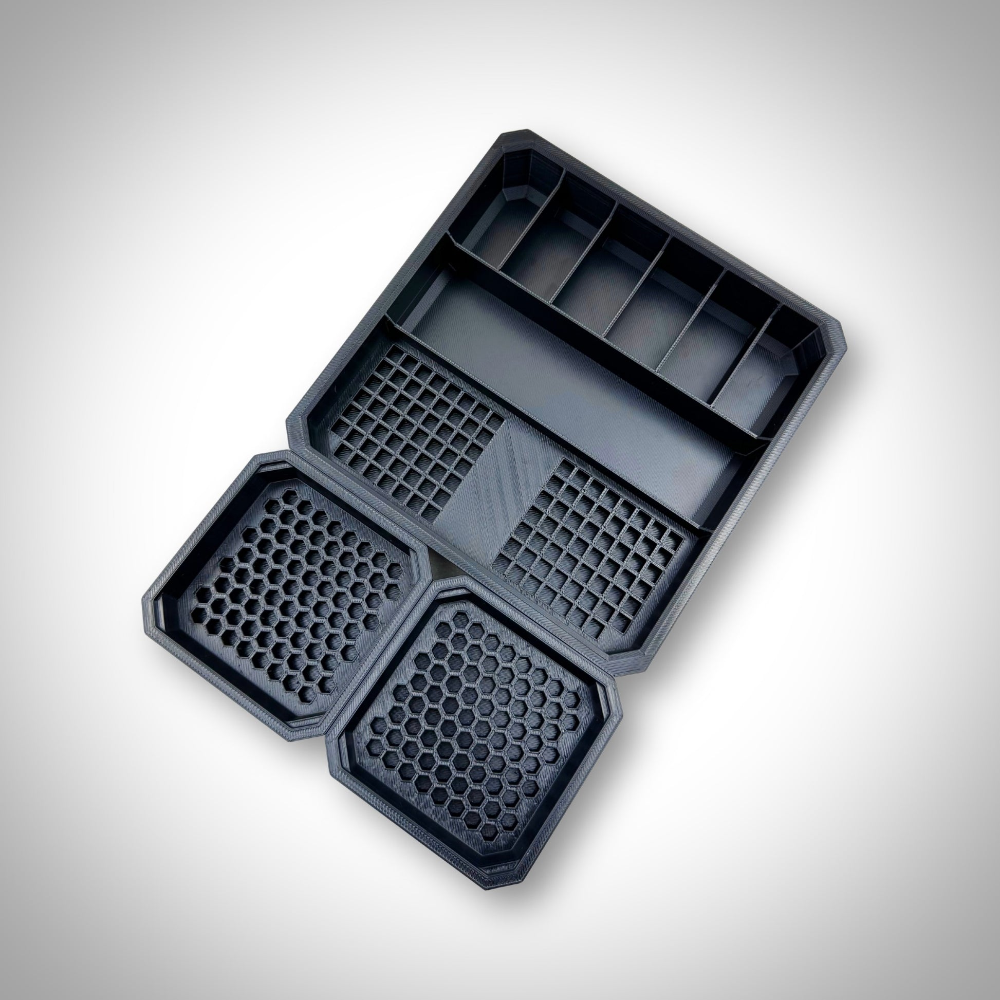 Impact Bit Organiser Combo insert shown empty and placed outside the PACKOUT™ Low Profile Organiser, highlighting durable construction and well-defined storage zones.