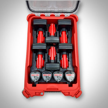 Milwaukee PACKOUT™ Compact Organiser with black M12 Battery Storage Insert fully loaded with M12 compact and extended batteries, neatly organised inside the toolbox.