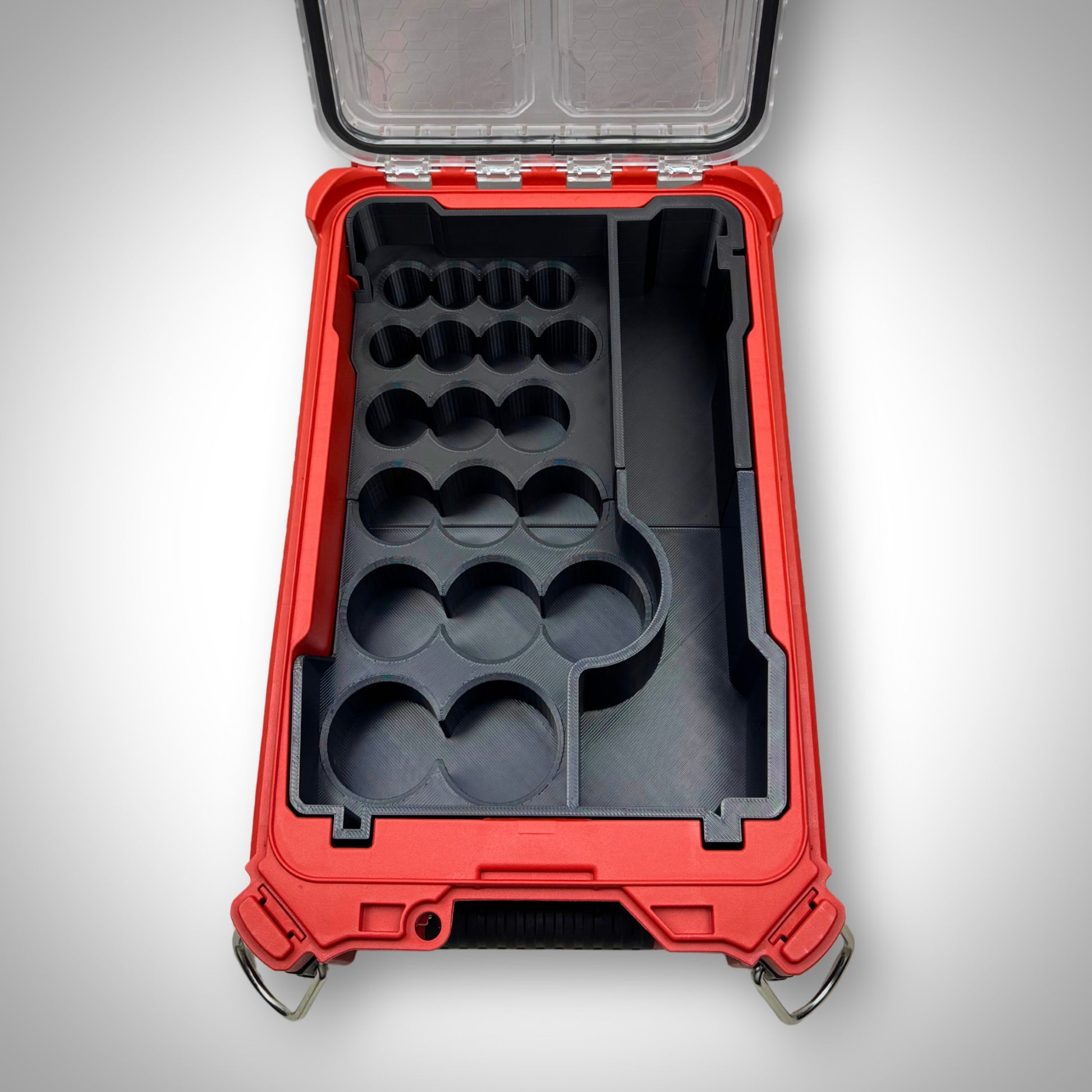 Empty SAE socket organiser insert displayed inside the Milwaukee PACKOUT Toolbox, showing precise socket grid layout and durable construction.