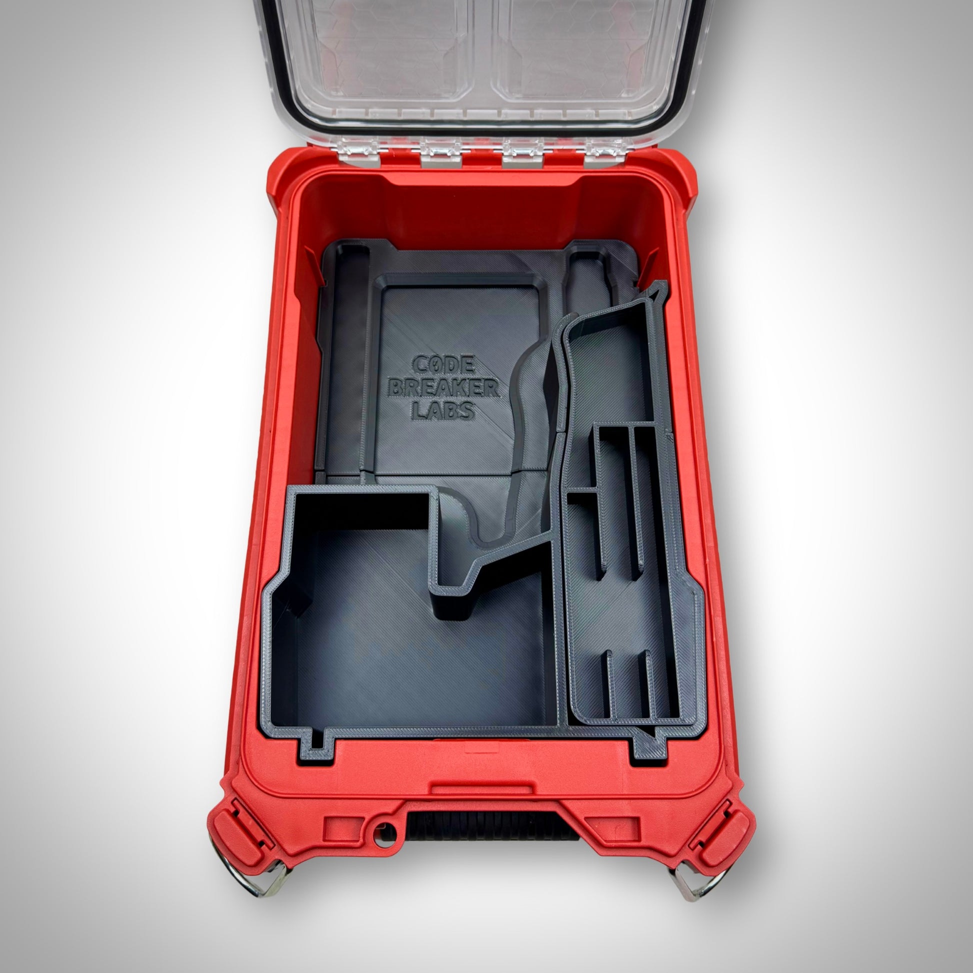 Empty custom insert for M12 FUEL Jigsaw shown inside of the Milwaukee PACKOUT Compact Organiser, highlighting compartment layout and precision fit.