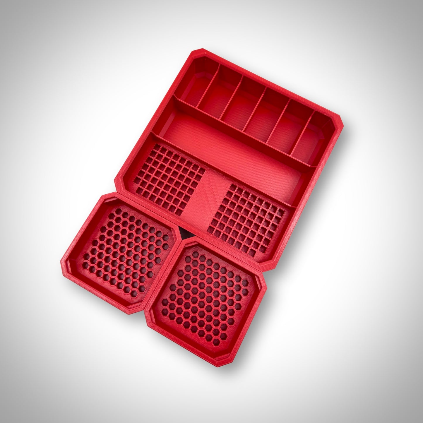 Red Impact Bit Organiser Combo insert shown alone, outside of the PACKOUT™ container, emphasizing its robust build and organized storage areas.