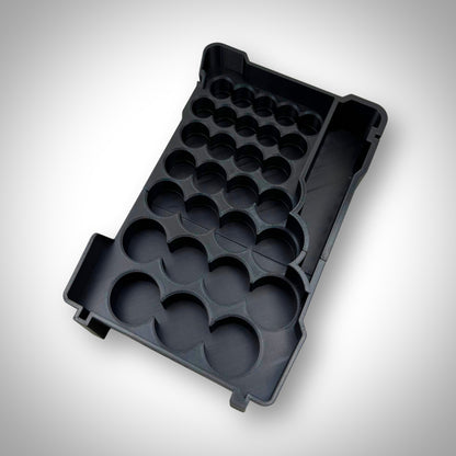 Empty metric socket organiser insert displayed outside the Milwaukee PACKOUT Toolbox, showing precise socket grid layout and durable construction