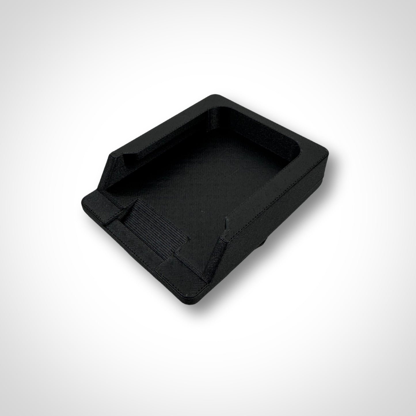 Makita 40V adaptor insert shown outside of the PACKOUT™, featuring molded battery slots for a precise, secure fit.