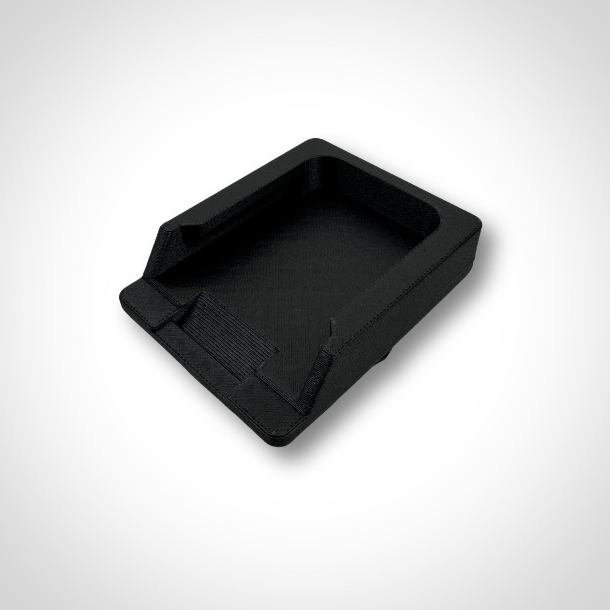 Makita 40V adaptor insert shown outside of the PACKOUT™, featuring molded battery slots for a precise, secure fit.