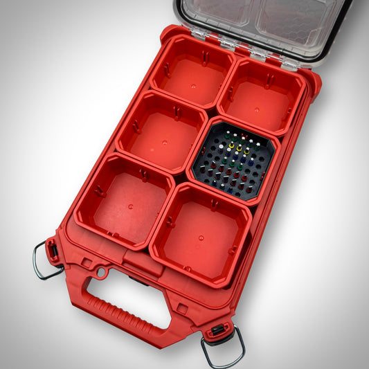 Black Milwaukee PACKOUT™ Low-Profile Bit Holder Insert fully stocked with impact bits, neatly arranged inside a PACKOUT™ bin.