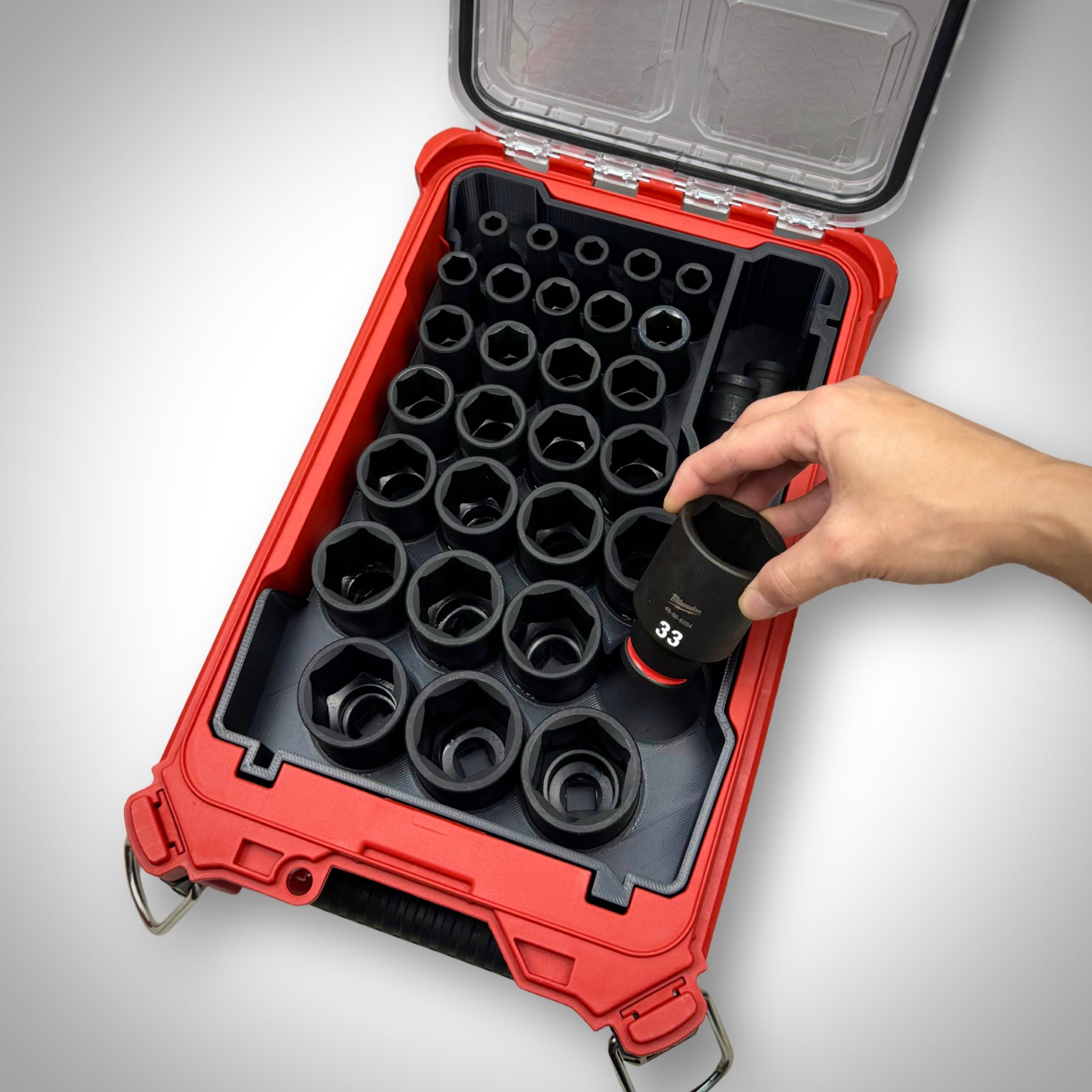 Metric socket organiser inside the Milwaukee PACKOUT Toolbox, fully loaded with sockets showcasing the accessories ease of access.
