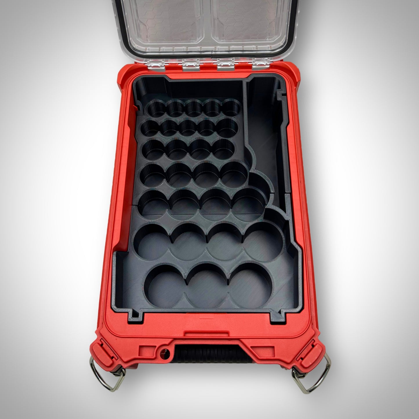 Empty metric socket organiser insert displayed inside the Milwaukee PACKOUT Toolbox, showing precise socket grid layout and durable construction.