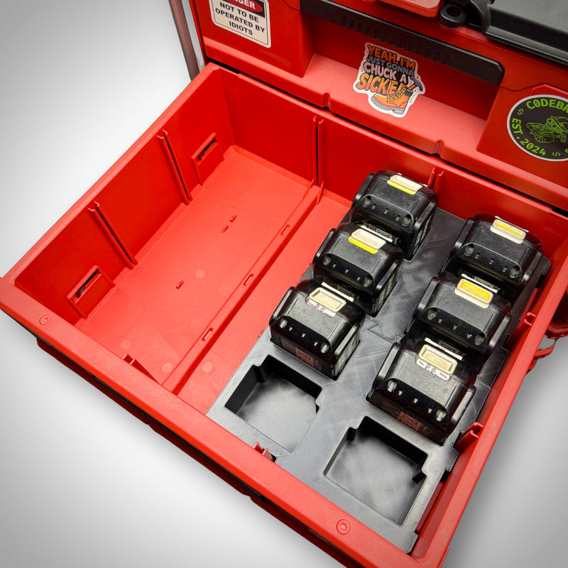 Makita 18V Battery Storage Insert fully loaded with six Makita 18V batteries, neatly organised within the Milwaukee PACKOUT™ Two-Drawer Toolbox.