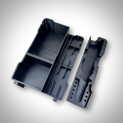 M12 Soldering Iron Insert displayed outside the PACKOUT™ Compact Organiser, highlighting durable, heat-resistant construction and compartment layout.