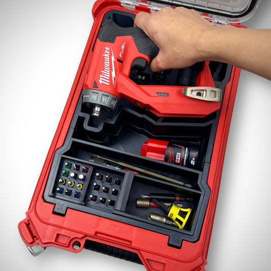 Milwaukee PACKOUT Compact Organiser with Installation Driver insert fully loaded with the driver, heads, and accessories, neatly organized inside the container, demonstrating the ease of access.