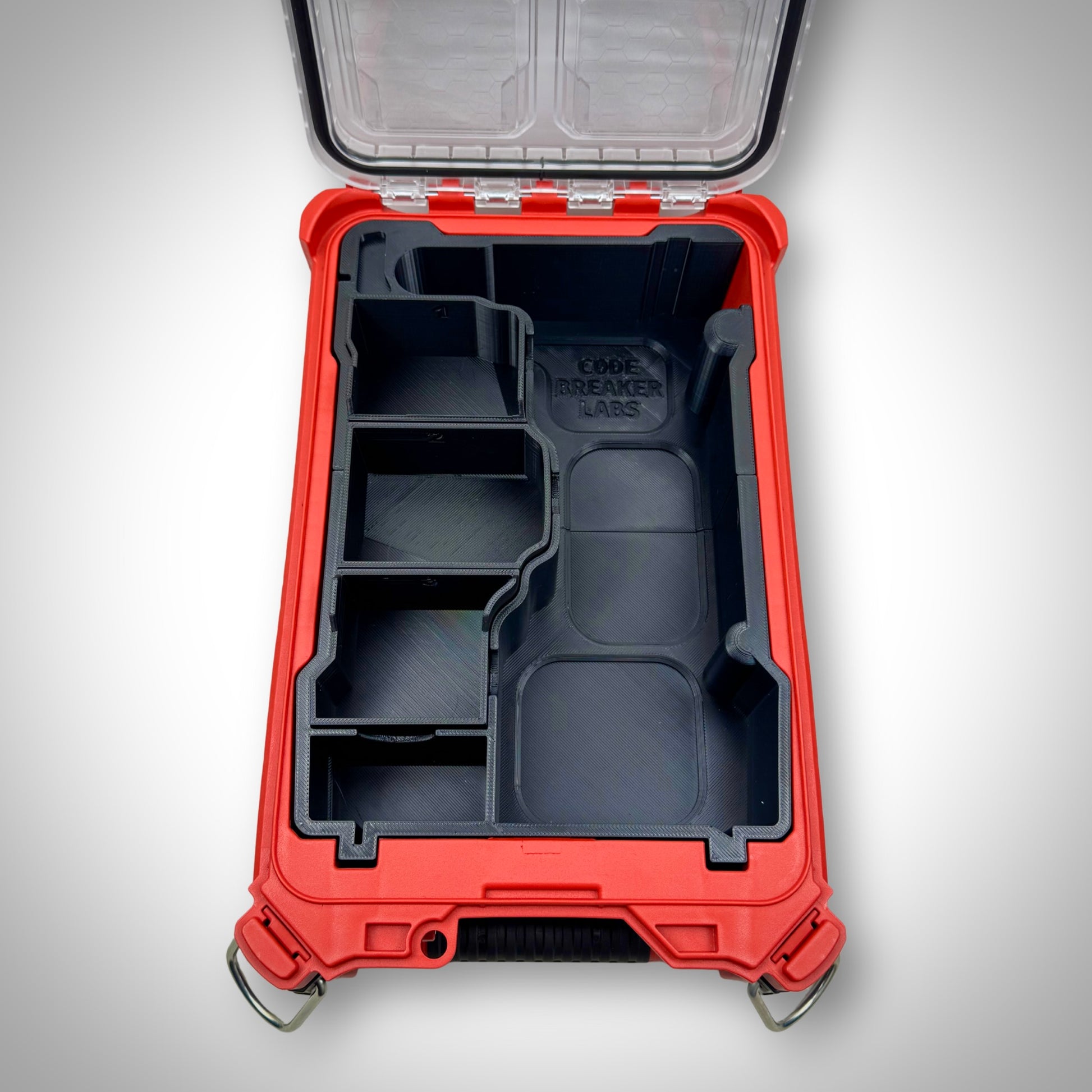 Empty Milwaukee PACKOUT insert for ratchet storage—showcasing all compartments and layout before tool placement.