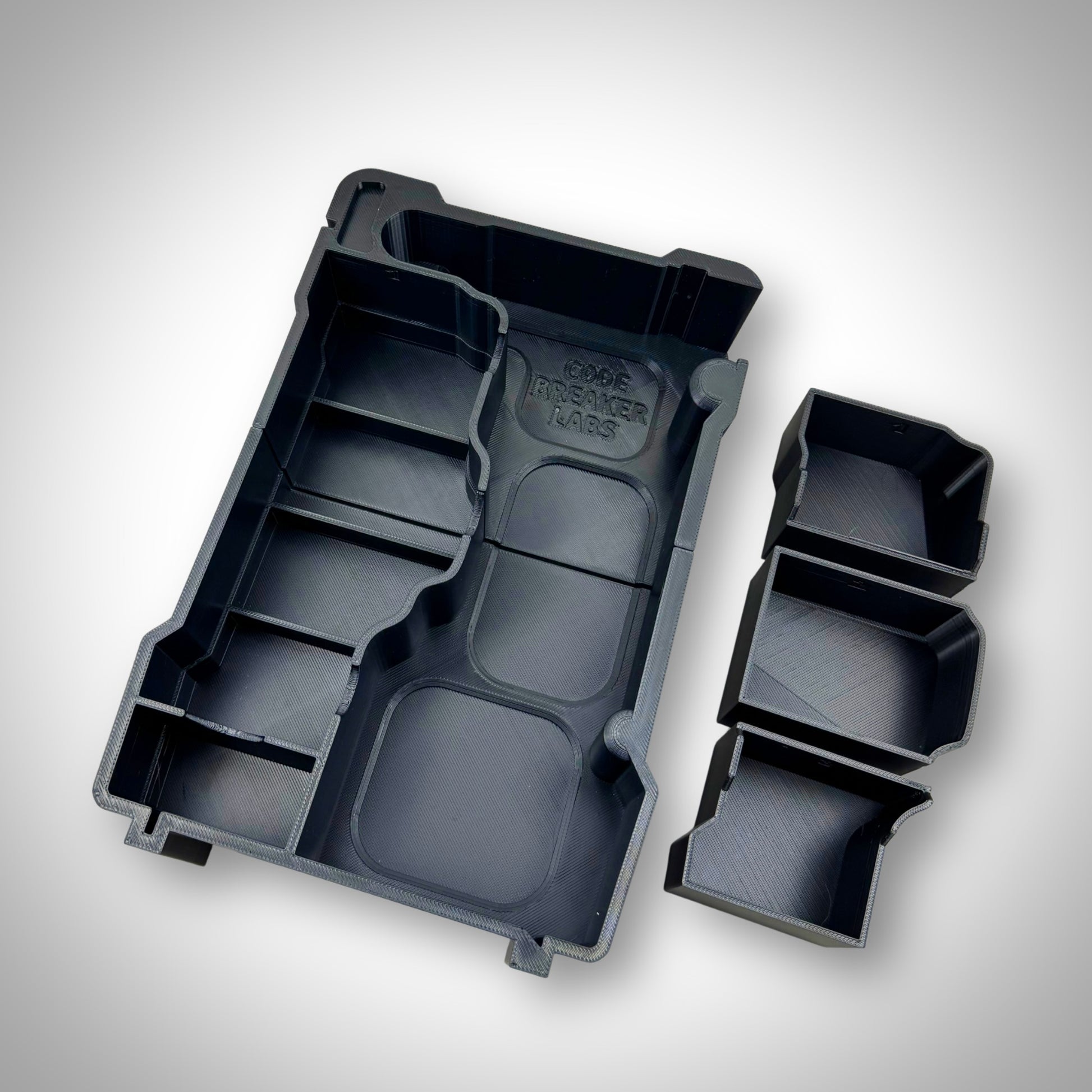 Empty Milwaukee PACKOUT insert for ratchet storage—showcasing all compartments and layout before placement inside the PACKOUT container.