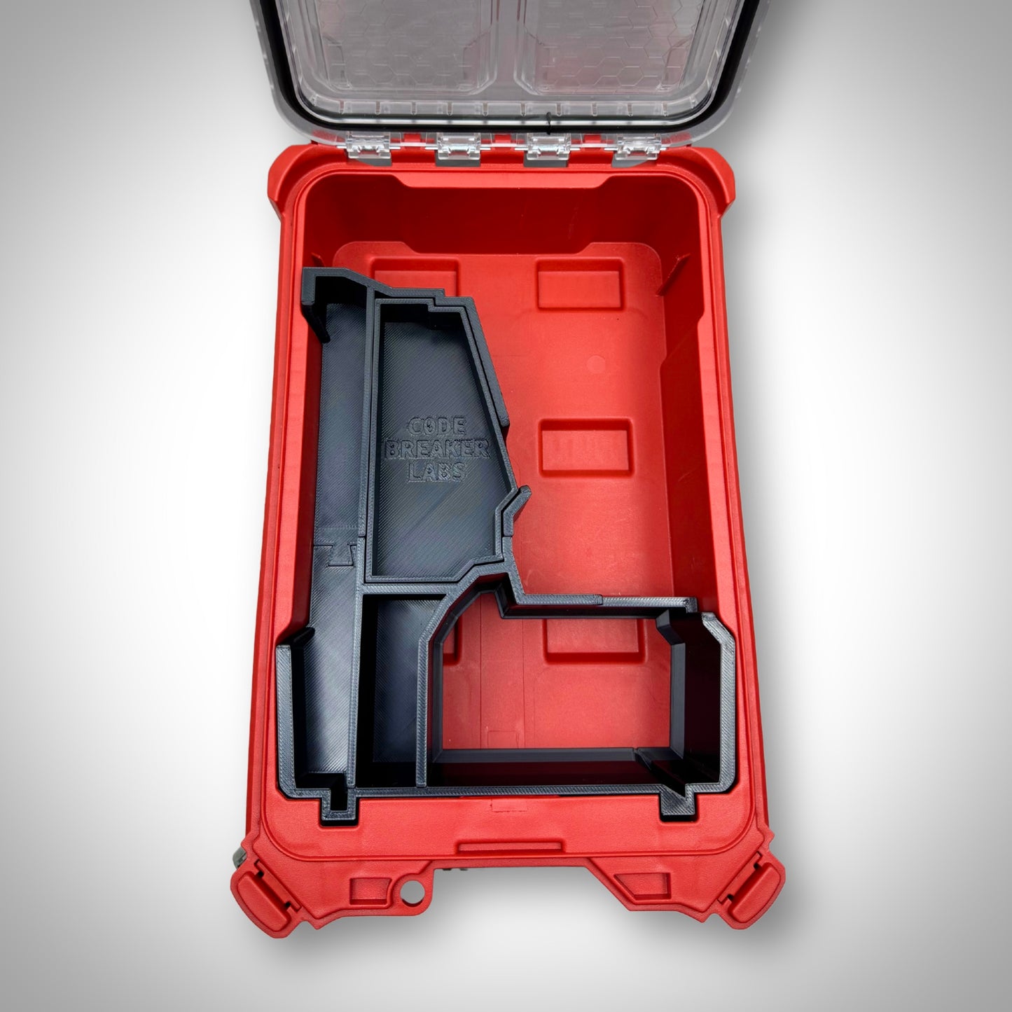 Empty M18 Drill Insert fitted inside the Milwaukee PACKOUT™ Compact Organiser, showcasing the molded compartments designed for drill and accessories.